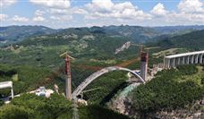 世界最大跨径悬浇拱桥――古金高速水落河特大桥完成拱圈合龙